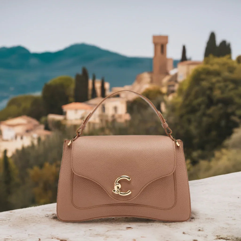 Coccinelle: Storia, Valori e Innovazione del Brand di Borse in Pelle Made in Italy - Marylou Shop